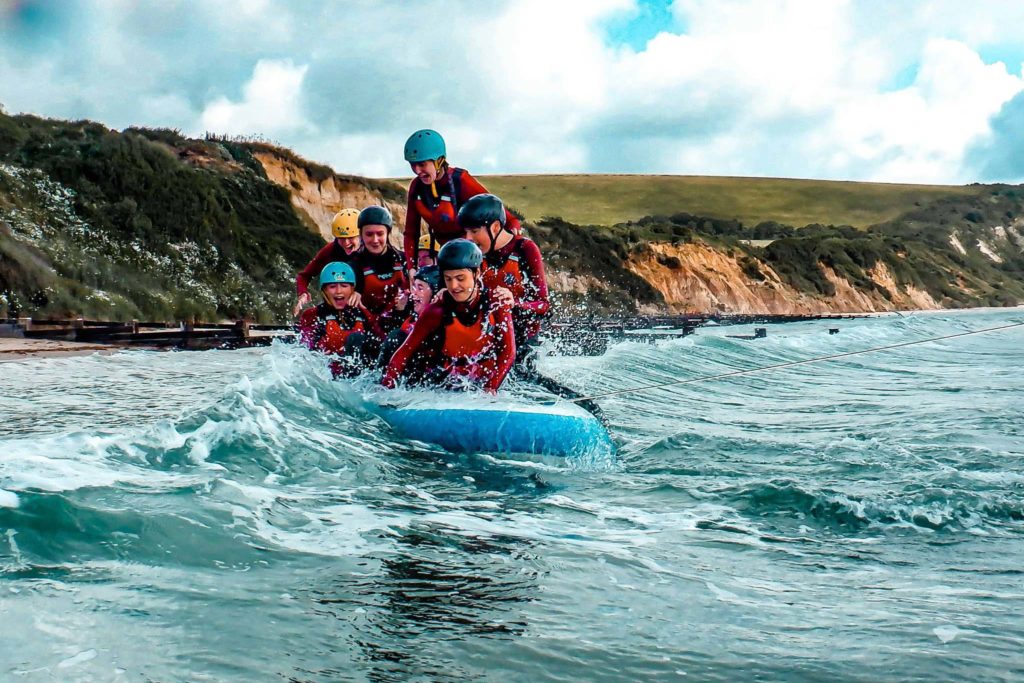 Children on a Jumbo SUP as part of their Duke Of Edinburgh award