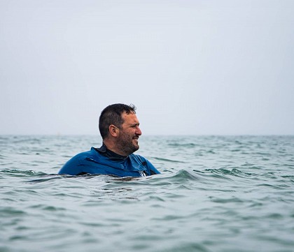 instructor out at sea swimming