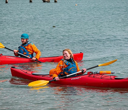 Picture of two people kayaking