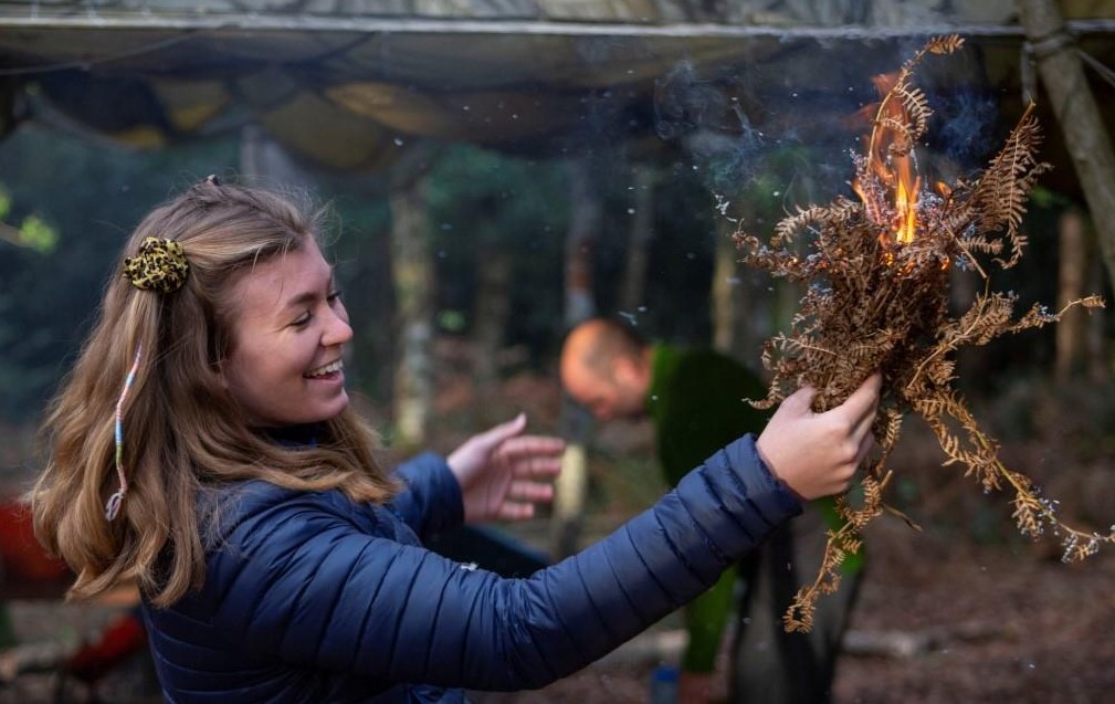 Introduction to friction fire lighting on a bushcraft training course