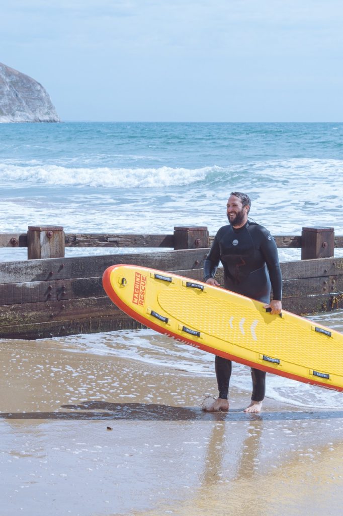 OutDoor Instructor walking of the beach lifeguarding, for the princess trust development award