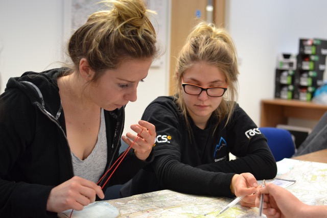 Outdoor instructors prepping for an outdoor qualification course